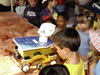 Children look at a rover