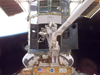 Astronaut is space working on Hubble. Click here to read blog