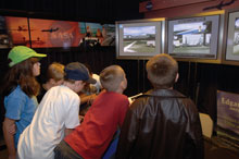 Children experiencing the Edgarville exhibit