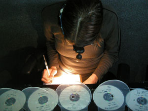 Lena Krutikov working with DVDs