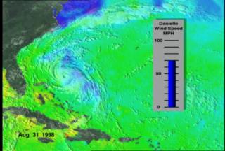 A combined image of clouds from GOES and sea surface temperatures from TRMM in the Atlantic on August 31, 1998.  This image shows Hurricane Danielle right on top of the cooler ocean region caused by Hurricane Bonnie.