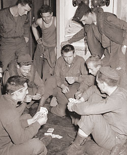 Image of Servicemen playing cards (photo by Robert Olen)