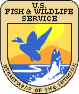 Fish and Wildlife Service Emblem depicting a flying duck and a fish coming out of water