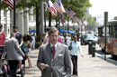 Deputy Secretary David A. Sampson poses for photos during celebration for National Tourism Week