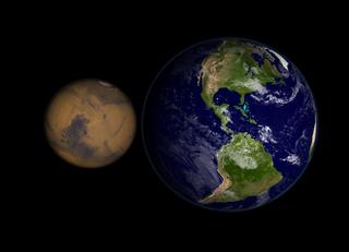 Still image comparing true color Mars to true color Earth