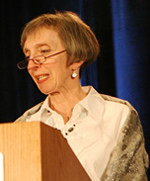  Molly Littleton speaking from a lectern 