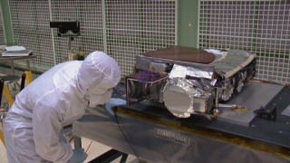 <b>HMI INSTRUMENT ARRIVAL</b> <br />The primary goal of the Helioseismic and Magnetic Imager (HMI) investigation is to study the origin of solar variability and to characterize and understand the Sun's interior and the various componenets of magnetic activity.
<p>For complete transcription of this video, please click <a href='hmi_arrival.html'>here</a>. 