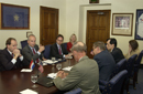 Dep. Secy. Sampson and members of his staff hold a table discussion with the Dutch Delegation