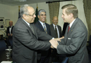 Dep. Secy. David Sampson greets Libyan Secretary for America's Affairs staff member