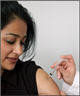 woman receiving a yellow fever vaccination