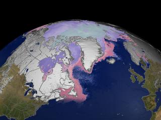 This image shows the snow cover and sea ice surface temperature over the North Pole on March 23, 2003.