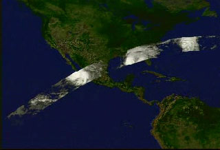 A fly along to TRMMs orbital path on September 2, 1998, showing the three-dimensional
structure of the precipitation of four hurricanes, Howard, Isis, Earl, and Danielle, as measured by the
Precipitation Radar instrument on TRMM.  In this animation, a surface of constant precipitation is colored
by the value of the precipitation on the ground under the surface.