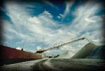 Self unloader unloading limestone at Hallet Dock No. 6