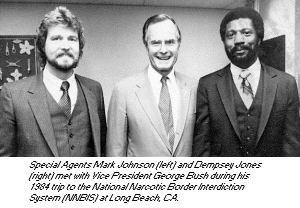 photo - Special Agents Mark Johnson and Dempsey Jones met with Vice President George Bush during his 1984 trip to the National Narcotic Border Interdiction System at Long Beach, CA.