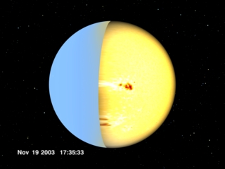 The trailing spot group moves to the Earthside view of the Sun (November 19, 2003).