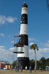 Workers at the Cape Canaveral Lighthouse remove the lamp room.