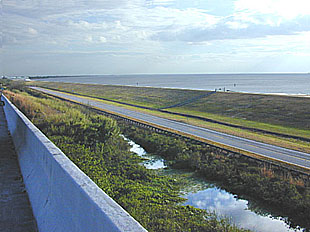 The earthen levee with Lake Okeechobee in the background