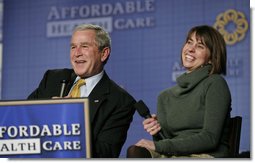 President George W. Bush and panelist Amy Childers react to an audience members question during a forum discussion on health care initiatives Wednesday, Feb. 21, 2007, at the Chattanooga Convention Center in Chattanooga, Tenn. White House photo by Paul Morse