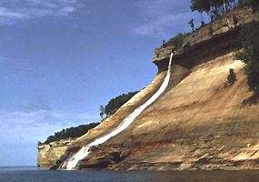 Bridalveil Falls cascades over the Pictured Rocks cliffs in a lovely springtime display.