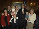 Secretary Gutierrez with Assistant Secretary David Spooner and family