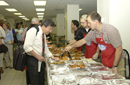 NOAA Staff and volunteers serve up food for the fish fry 