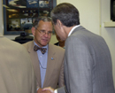 Secy Gutierrez shakes hands with Deputy Assist Secy Keeney