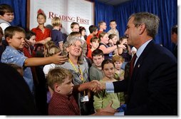 President George W. Bush greets students and tea chers after delivering remarks on education at Read-Patillo Elementary School in New Smyrna Beach, Fla., Thursday, Oct. 17. White House photo by Eric Draper. Wh ite House photo by Eric Draper.