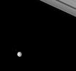 Two moons of Saturn rendezvous in the Saturnian skies above the Cassini spacecraft