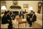 President George W. Bush meets with Vietnamese democracy and human rights activists Tuesday, May 29, 2007, in the Oval Office of the White House. White House photo by Joyce Boghosian