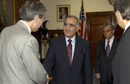 Secretary Gutierrez greets Minister Khan's staff Member