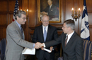 Secretary Gutierrez congratulates  NIST Director Bill Jeffrey