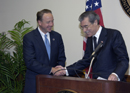 Secretary Gutierrez shakes hands with Michael Gallagher