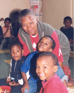 A counselor works with AIDS-affected children at Jabavu Clinic in Soweto.