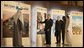 President George W. Bush points to a display in the Masdar Exhibition Monday, Jan. 14, 2008, at the Emirates Palace Hotel. Created in 2006, Masdar is a global cooperative platform for open engagement in the search for solutions to some of mankind's most pressing issues, such as energy security, climate change and truly sustainable human development. White House photo by Eric Draper