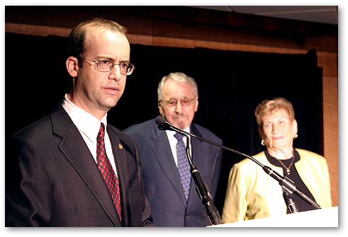 Amy's parents  Mr. and Mrs. Sheldon Zoslov listen to Commissioner Adelstein as he describes Amy's contributions to public service.