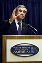 Secretary Carlos M. Gutierrez speaks at podium