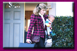 Mother leaving house carrying baby and briefcase