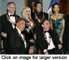 The 2006 Kennedy Center honorees pose for a group photo with Secretary of State Condoleezza Rice at the State Department in Washington, DC December 2, 2006. [© AP Images]