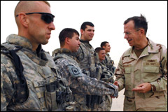 U.S. Navy Adm. Mike Mullen, chairman of the Joint Chiefs of Staff, thanks soldiers for their service during a visit to Baghdad, Iraq, Sept. 16, 2008. Defense Dept. photo by Air Force Master Sgt. Adam M. Stump