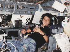 Astronaut Sally Ride in Space Shuttle Challenger's cabin during STS-7.