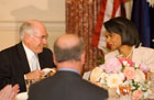 Secretary Rice talks with Australian Prime Minister John Howard during a luncheon at the State Department in Washington, Monday May 15, 2006. [© AP/WWP]