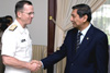 U.S. Navy Adm. Mike Mullen, chairman of the Joint Chiefs of Staff, is greeted by Indonesian Defense Minister Juwono Sudarsono in Jakarta, Indonesia, May 29, 2008. Defense Dept. photo by U.S. Navy Petty Officer 1st Class Chad J. McNeeley 