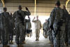 U.S. Nvy Adm. Mike Mullen, chairman of the Joint Chiefs of Staff, reenlists
soldiers from the 3rd Brigade Combat Team in Taji, Iraq, March 3, 2008. Defense Dept. photo by U.S. Navy Petty Officer 1st Class Chad J. McNeeley