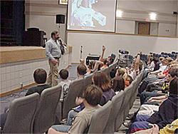 Picture of Tom Nolan speaking to kids about science
