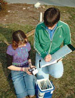 Chris Hanawalt and Gianna D'Emilio Taking Aerosol Measurements