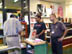 Shoppers at the duty free shop in the Baghdad International Airport (formerly Saddam International Airport) which has been refurbished and repaired as part of  a $17.5 million contract from USAID to SkyLink to rebuild Iraqi airports in Baghdad, Basrah and Mosul . The Baghdad airport was severely damaged during the war. The duty free shop is open and awaiting passengers. Currently only military, UN and one or two 15-seat propeller planes whcih carry aid workers land at the airport. The airport has the capacity to handle 7.5 million passengers a year but security concerns have kept commercial flights from returning.