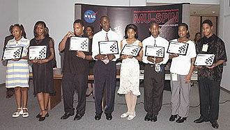 Students from Drew Freeman Middle School holding certificates they received from the Minority University-Space Interdisciplinary Network.
