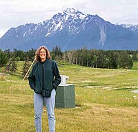 Elissa Levine standing in front of mountains