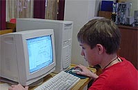 Harry Swan sitting at a computer