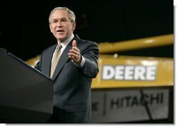 President George W. Bush addresses his remarks on the economy and tax relief to an audience in Kernersville, N.C., following a tour of the John Deere-Hitachi excavator assembly line, Monday, Dec. 5, 2005. White House photo by Eric Draper